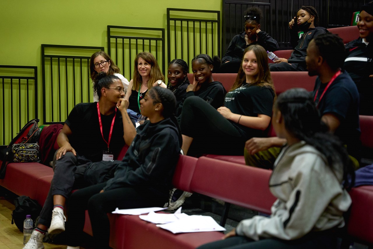 Students in a performing international plays workshop